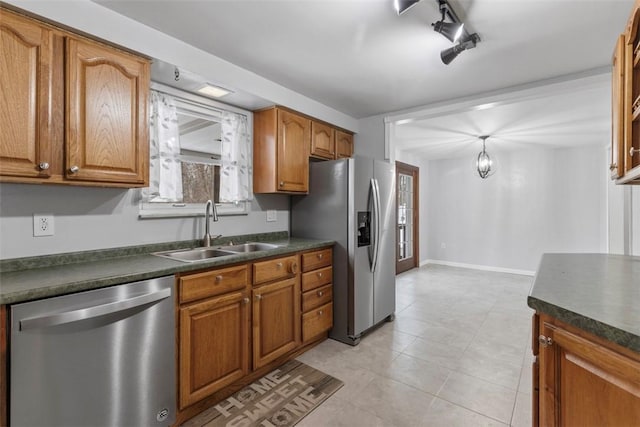 kitchen featuring stainless steel appliances and sink