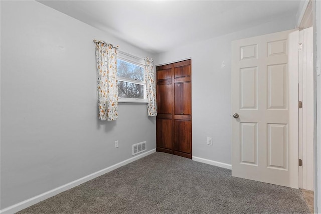 unfurnished bedroom with carpet