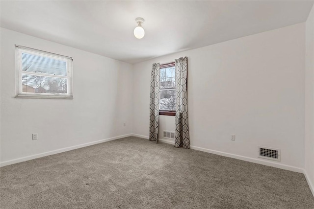 view of carpeted spare room