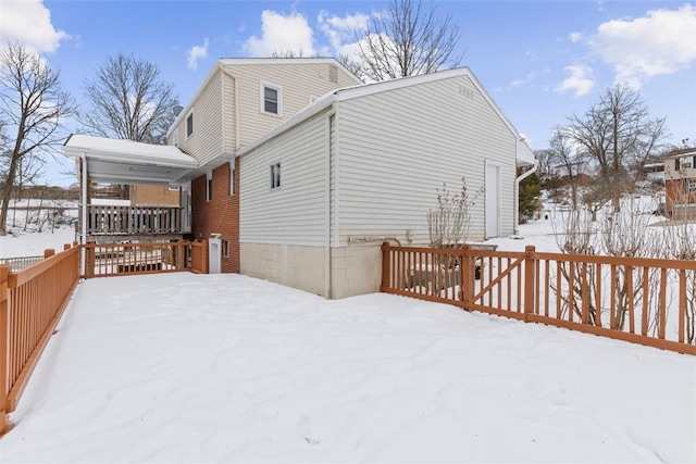 view of snow covered property