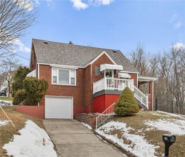 view of front of property with a garage