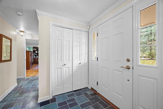 entryway featuring crown molding