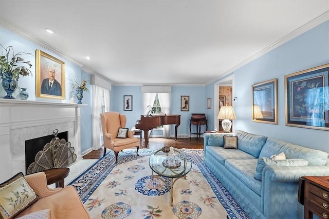 living room featuring hardwood / wood-style floors, a fireplace, and ornamental molding