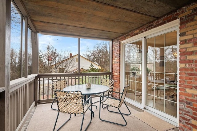 sunroom / solarium with wooden ceiling