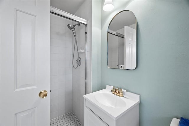 bathroom featuring vanity and an enclosed shower