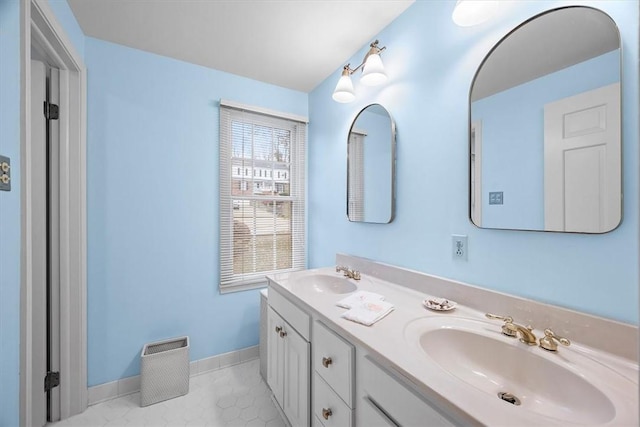 bathroom featuring tile patterned floors and vanity