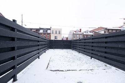 view of yard layered in snow