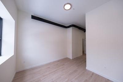 bonus room featuring light hardwood / wood-style flooring