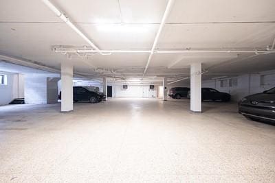 garage featuring a carport