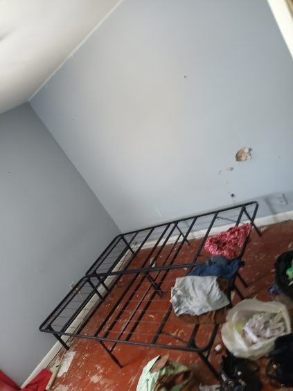 stairway featuring lofted ceiling