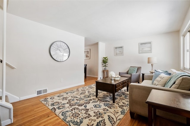 living room with hardwood / wood-style flooring