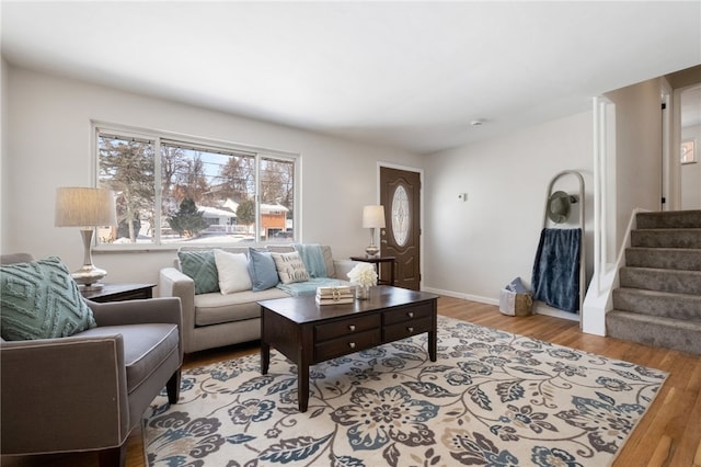 living room with light hardwood / wood-style flooring