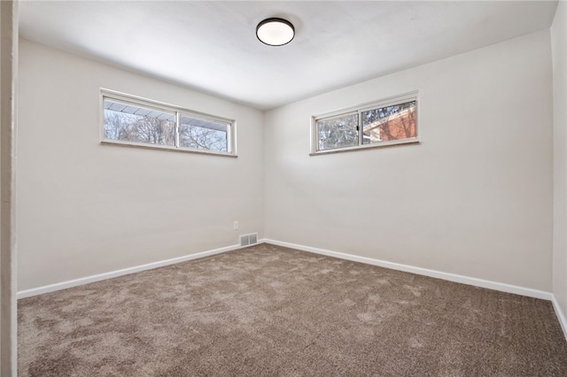 spare room with carpet flooring