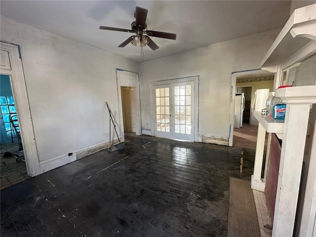 unfurnished living room featuring ceiling fan