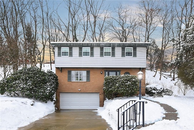 view of front of property with a garage