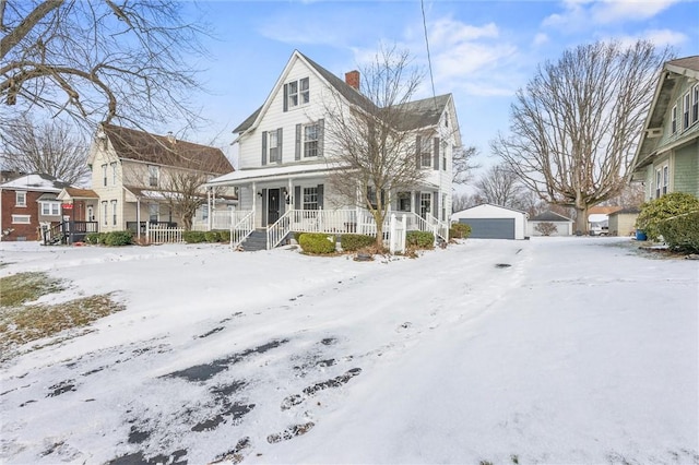 1334 W Ridge Ave, Sharpsville, PA 16150 - view of front of home with a porch, a chimney, an outdoor structure, and a detached garage