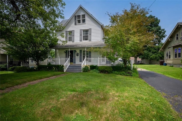 1334 W Ridge Ave, Sharpsville, PA 16150 - view of front of property featuring covered porch and a front lawn