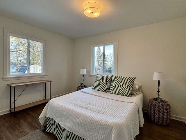 bedroom featuring dark hardwood / wood-style floors