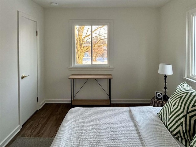 bedroom featuring dark hardwood / wood-style floors