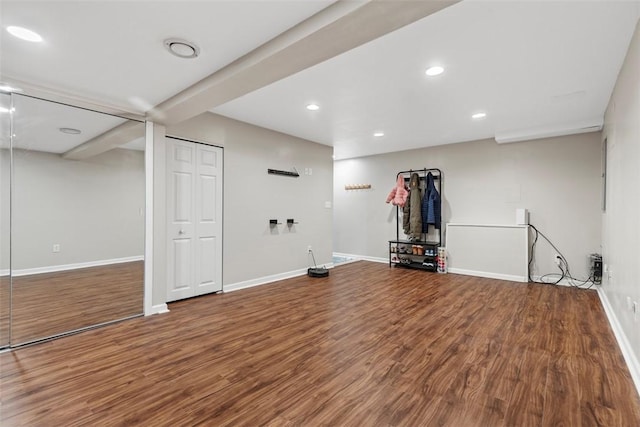 basement featuring hardwood / wood-style floors