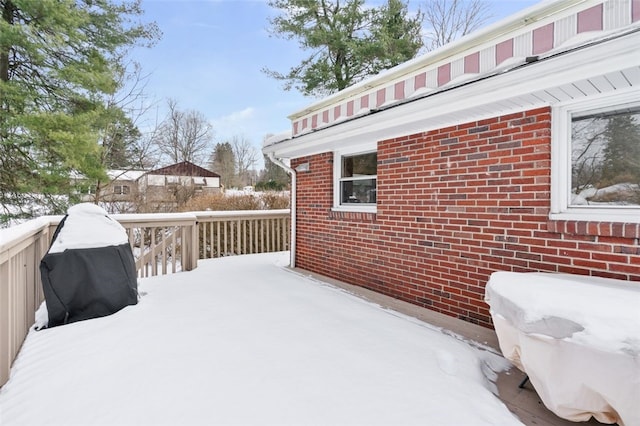 view of snow covered deck