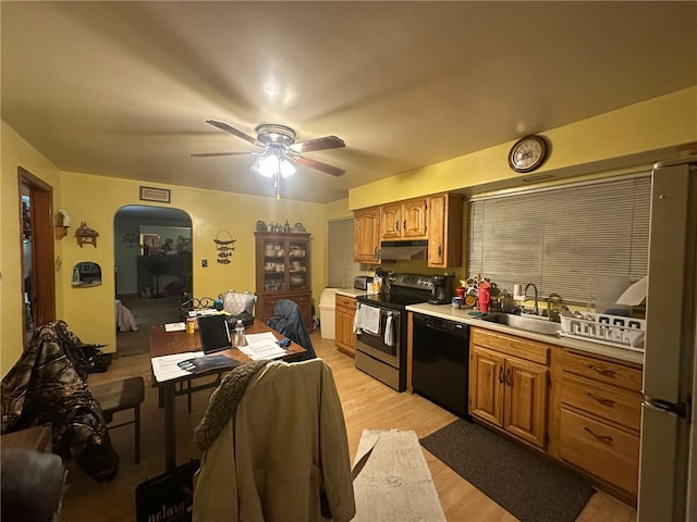 kitchen with sink, light wood-type flooring, fridge, dishwasher, and stainless steel electric stove