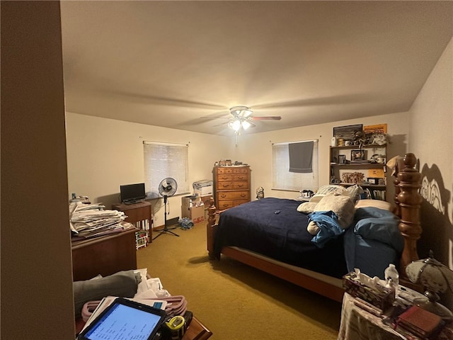 bedroom with light colored carpet and ceiling fan