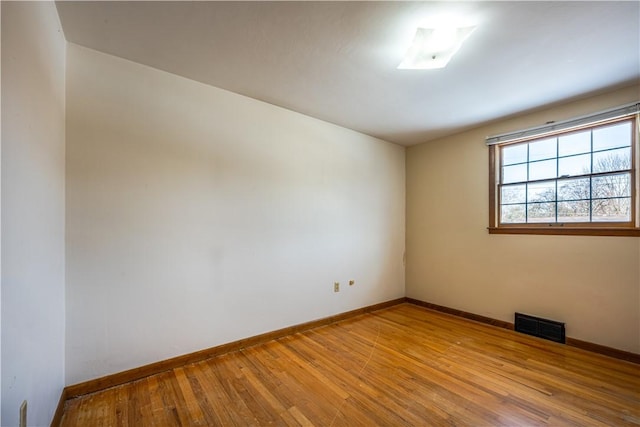 empty room with light wood-type flooring