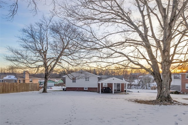 view of yard covered in snow