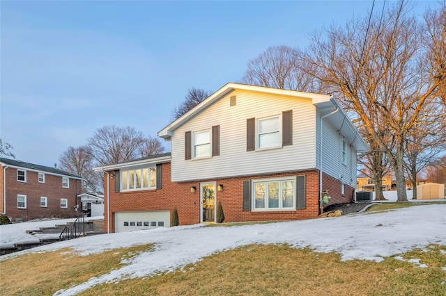 split level home featuring a garage