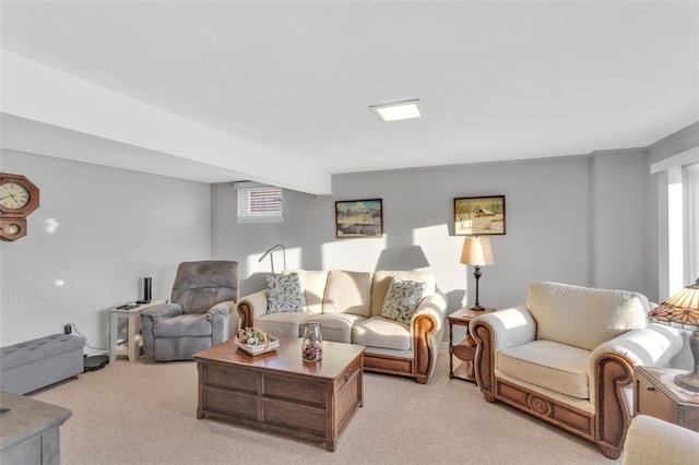 living room with plenty of natural light and light carpet