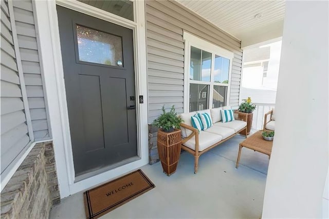 property entrance featuring covered porch