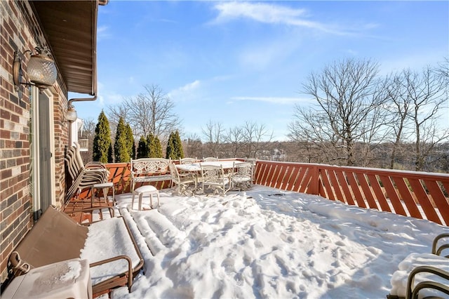 view of snow covered deck