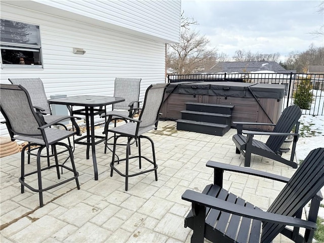 view of patio with a hot tub