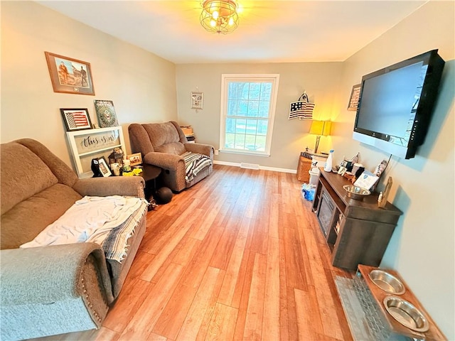 living room with hardwood / wood-style floors