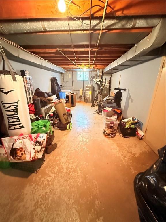 basement featuring water heater