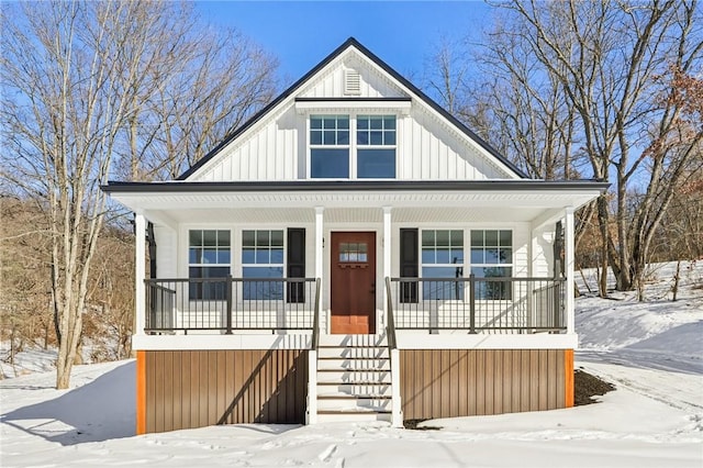 modern inspired farmhouse with covered porch