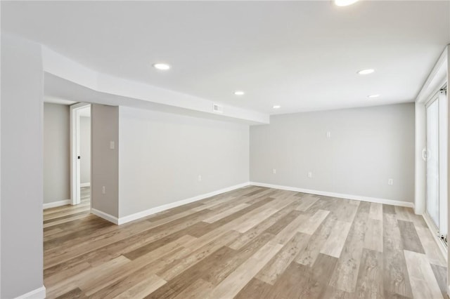 unfurnished room featuring light wood-type flooring