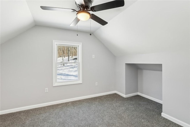 bonus room with ceiling fan, lofted ceiling, and carpet flooring