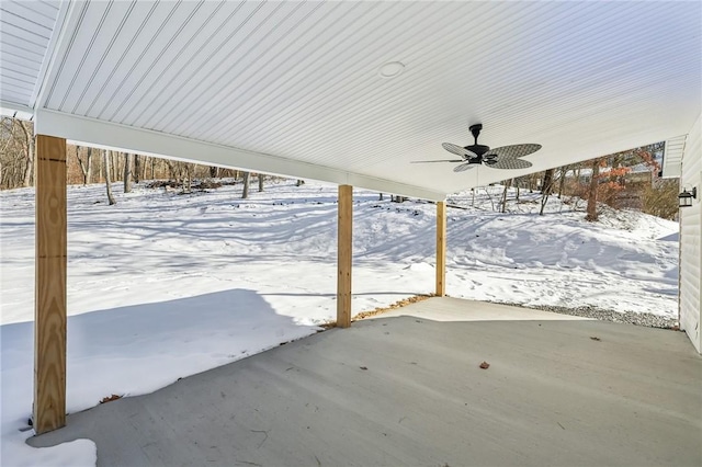 snow covered patio with ceiling fan