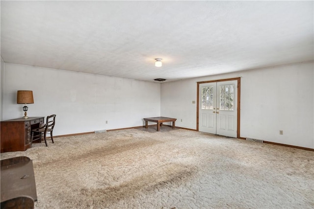 interior space featuring french doors and carpet floors