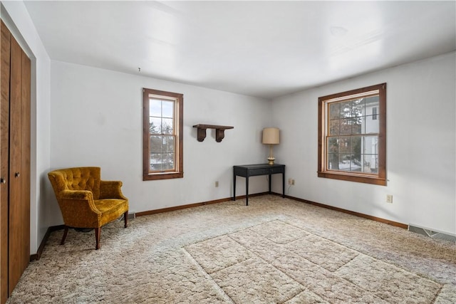 living area with carpet floors