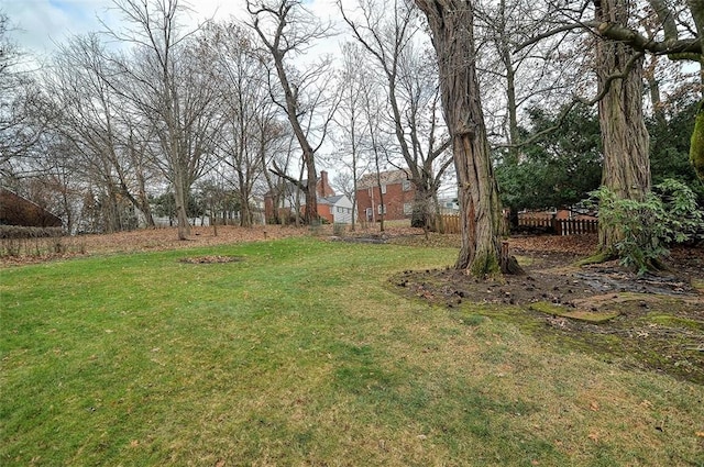 view of yard with fence