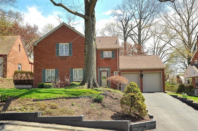 1722 Arlington Rd, Blackridge, PA 15235 - traditional home with a garage, a front lawn, brick siding, and concrete driveway