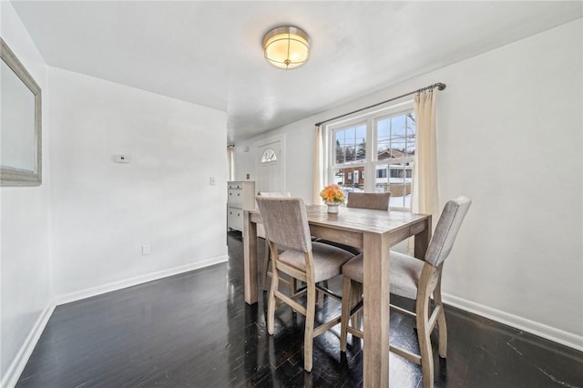 dining room featuring dark hardwood / wood-style floors