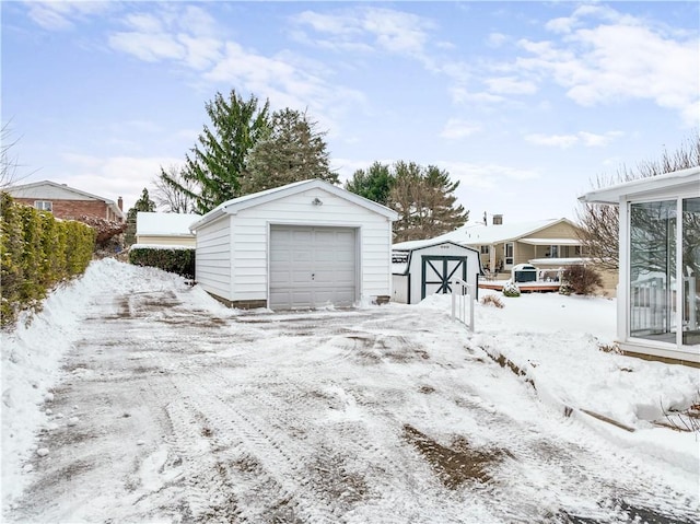 view of snow covered garage