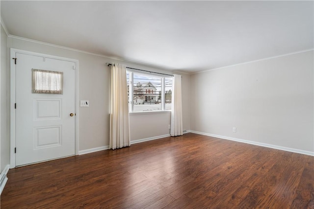 foyer with crown molding and dark hardwood / wood-style flooring