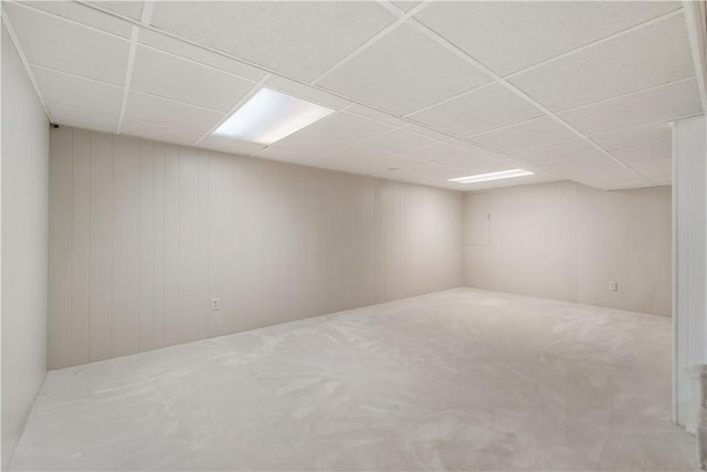 spare room with a drop ceiling