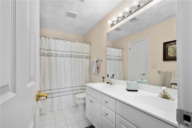 bathroom with vanity, tile patterned flooring, a shower with curtain, and toilet