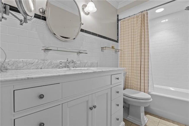 full bathroom with tile patterned flooring, ornamental molding, vanity, toilet, and shower / bath combo with shower curtain